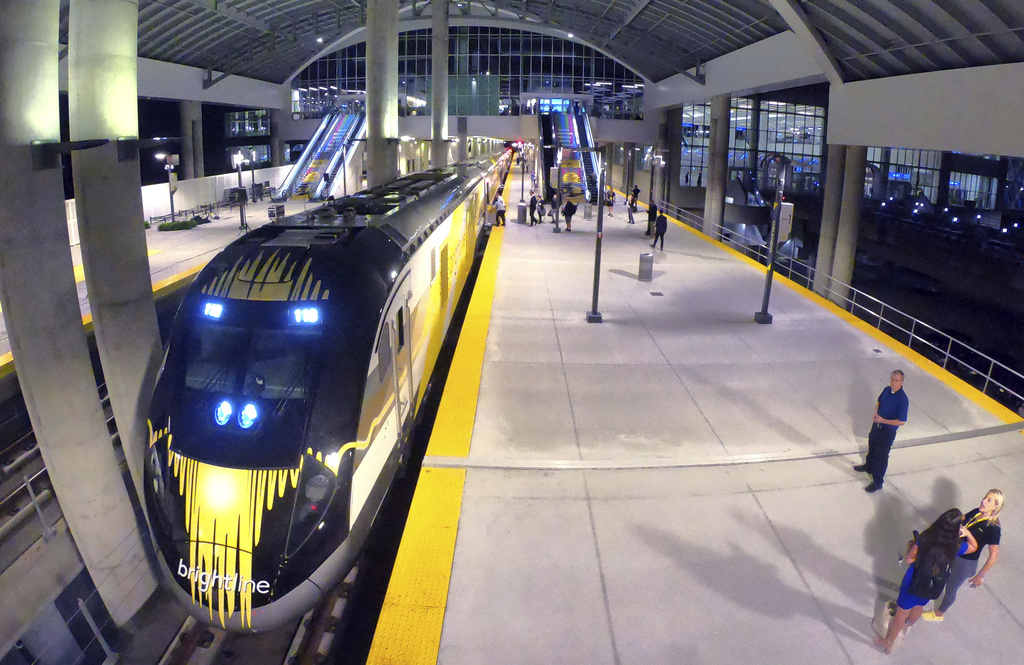 The first Brightline train to Miami for the debut of service from Orlando International Airport arrives in the station early Friday, September 22, 2023.