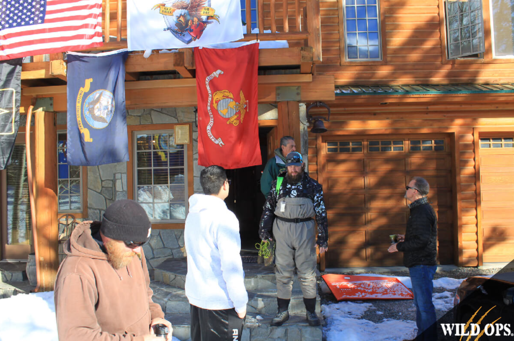 Several veterans prepare for adventure, service branch flags fly