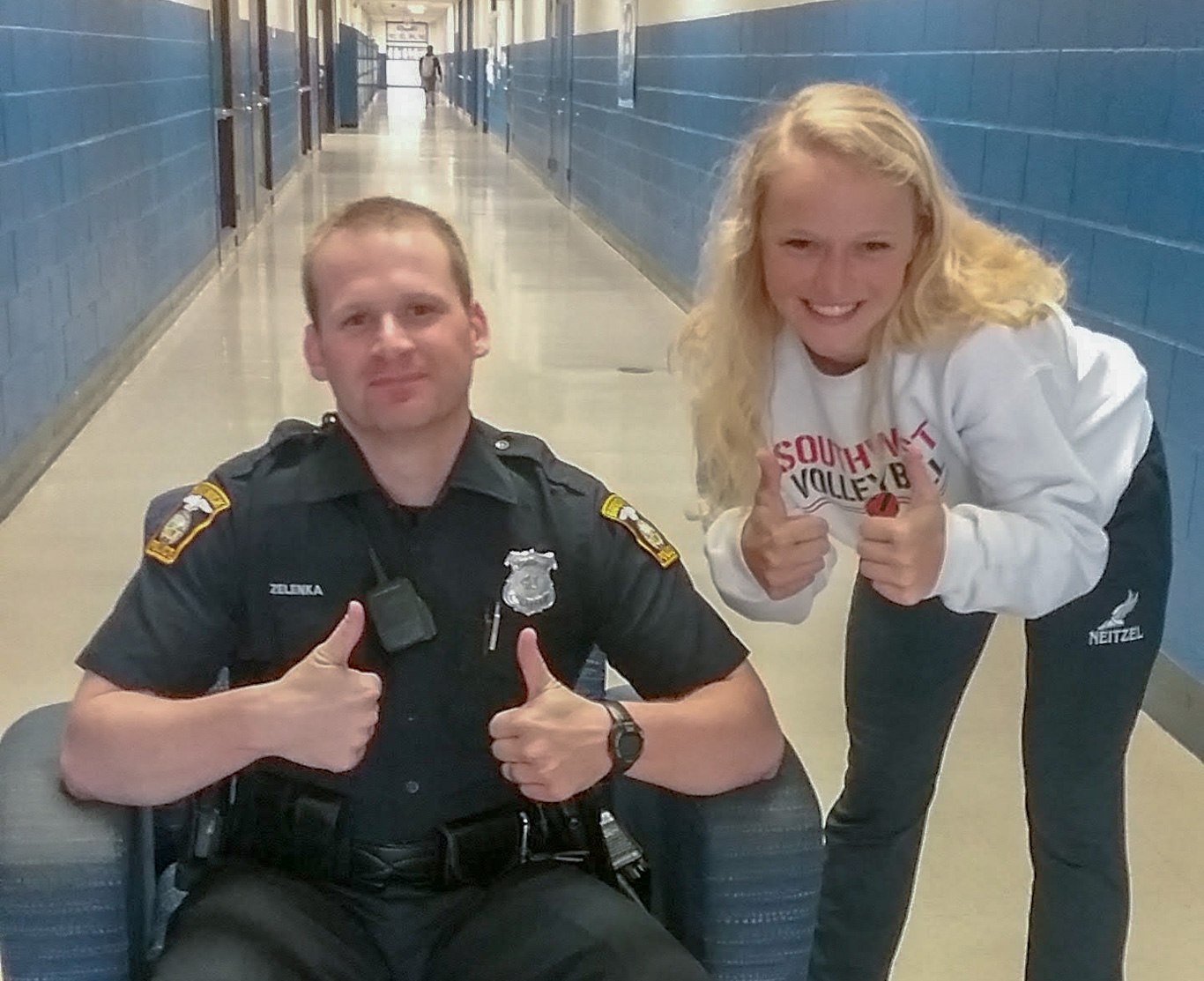 Officer Zelenka with a student while working as a school resource officer 