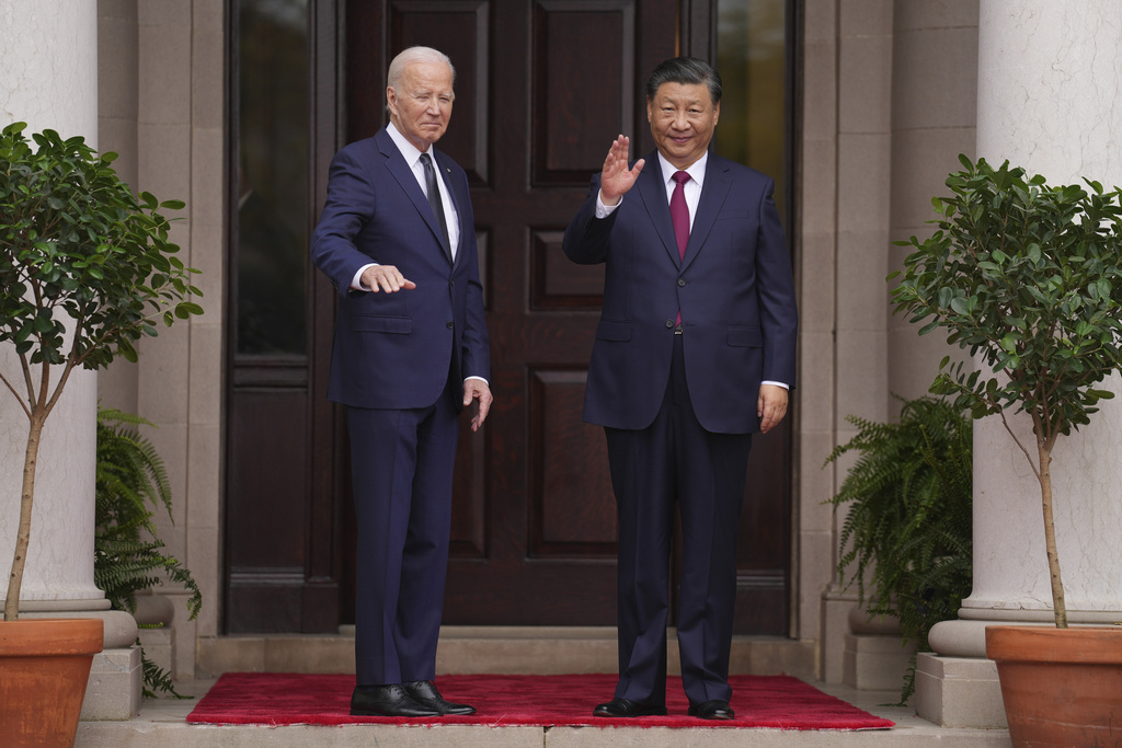 President Joe Biden greets China’s President President Xi Jinping at the Filoli Estate in Woodside, Calif.