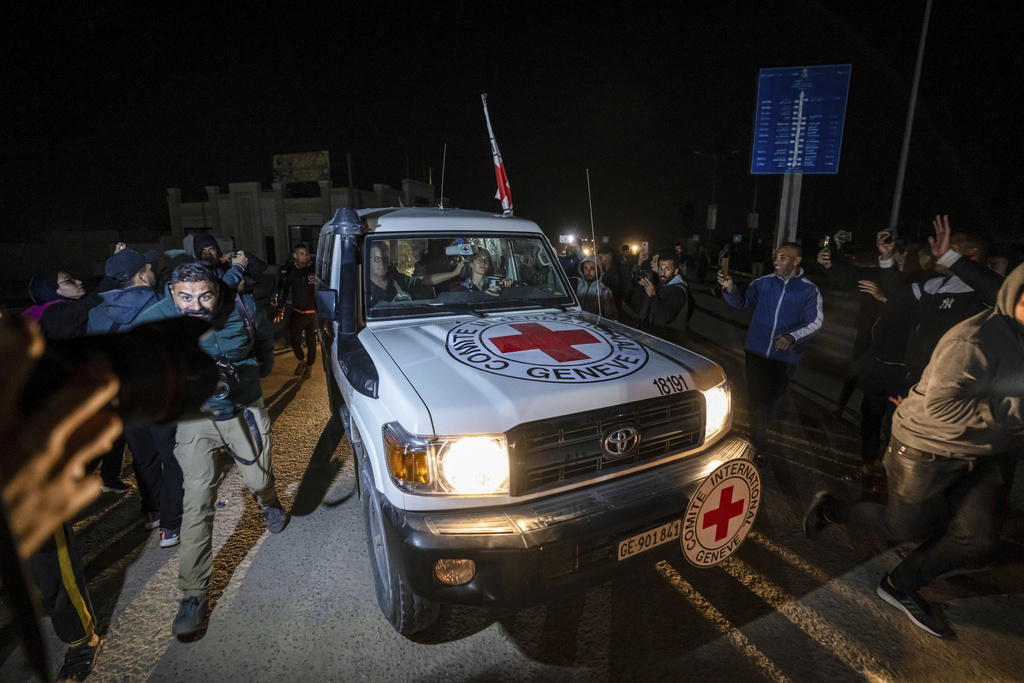 A Red Cross convoy carrying Israeli and foreign hostages heads to Egypt from the Gaza Strip