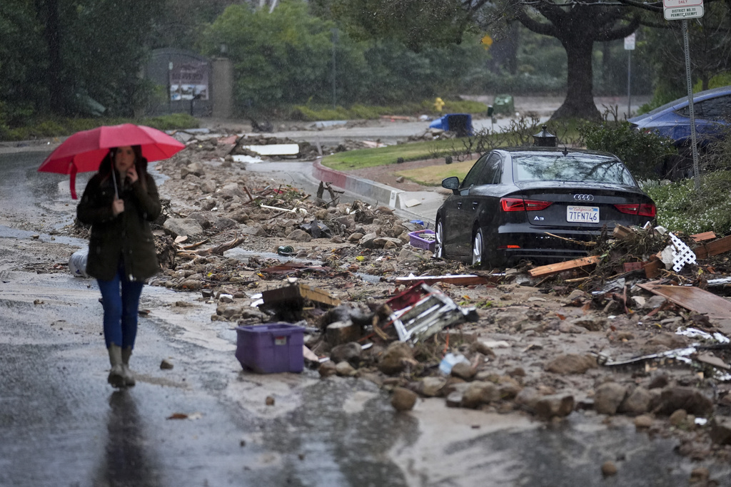 Mud and debris is strewn on Fryman Rd. during a rain storm in Studio City Calif. 