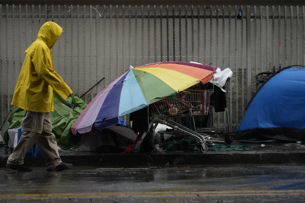 Heavy rain hits temporary tents in Skid Row, one of the largest populations of homeless people in the United States
