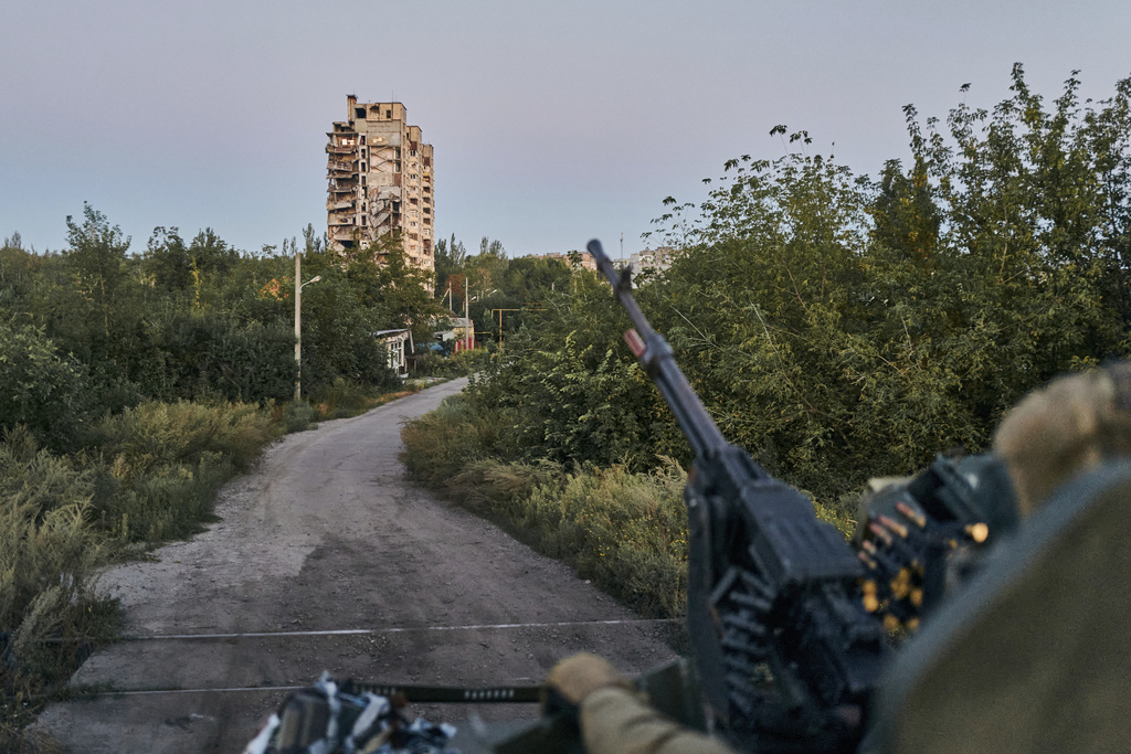 A Ukrainian soldier sits in his position in Avdiivka, Donetsk region, Ukraine