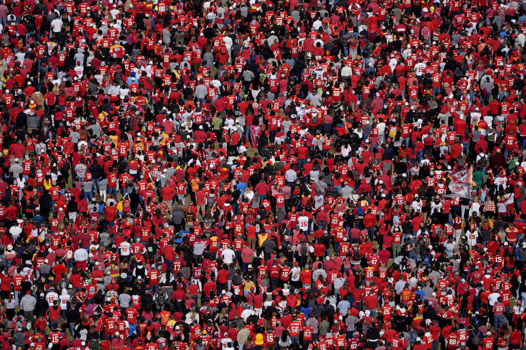 Fans watch as the Kansas City Chiefs celebrate during their victory rally at Union Station