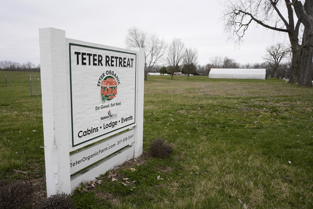 A sign welcomes guest to the Teter Organic Farm and Retreat Center in Noblesville, Ind.