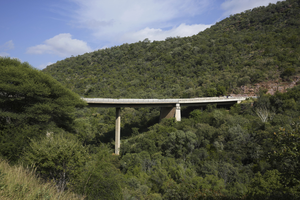 A view of a bridge a day after a bus plunged into a ravine