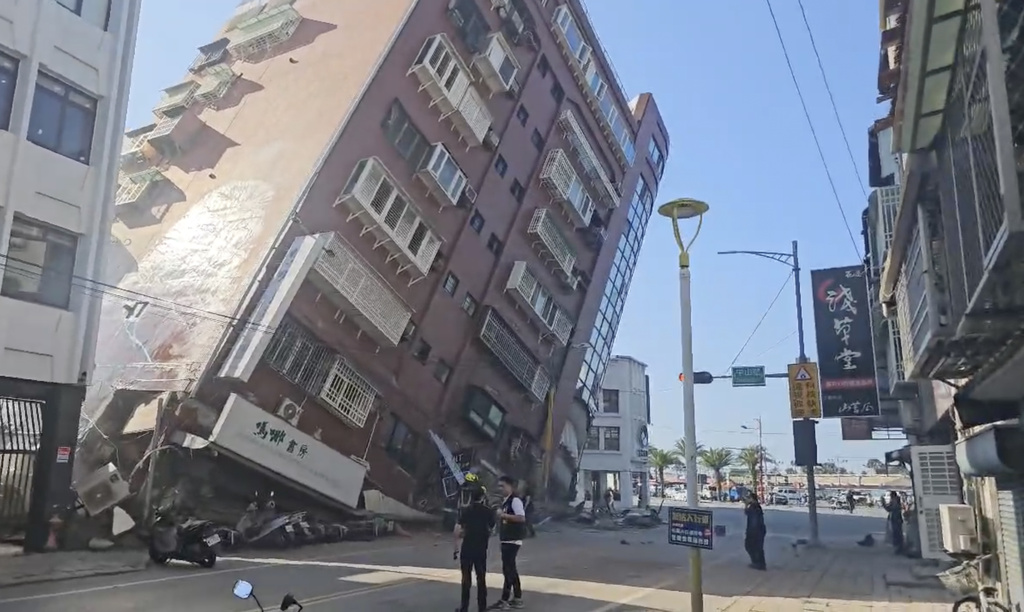 In this image taken from a video footage run by TVBS, a partially collapsed building is seen in Hualien, eastern Taiwan on Wednesday, April 3, 2024.