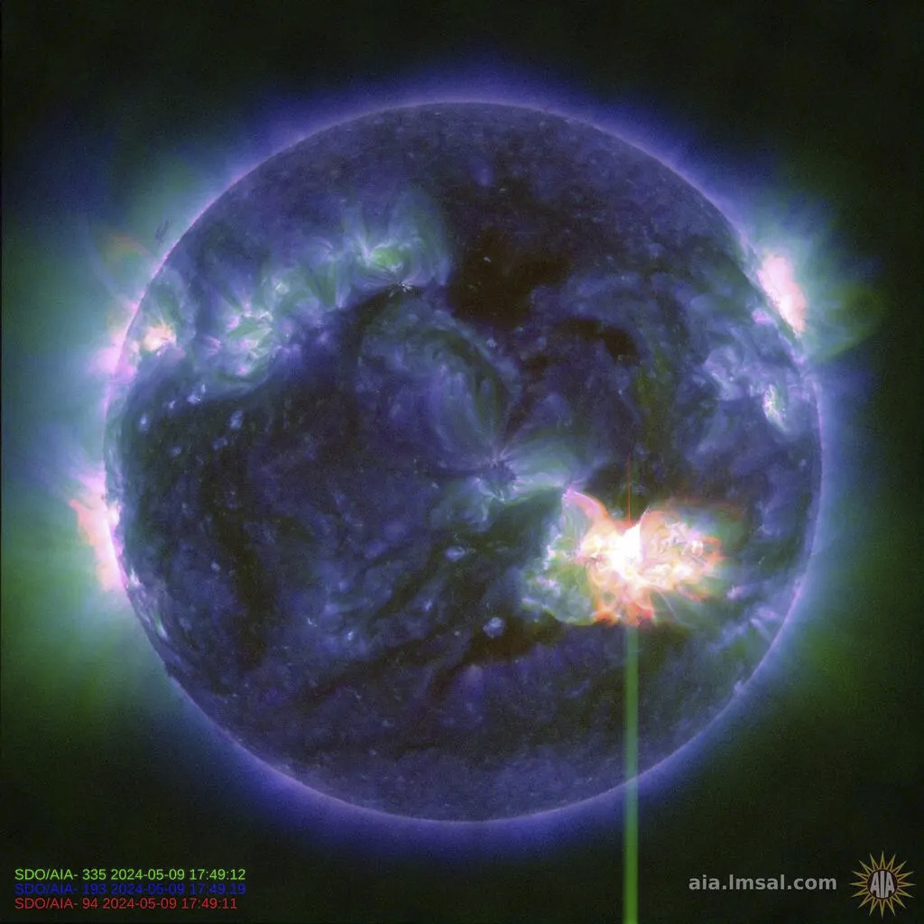 A solar flare, as seen in the bright flash in the lower right, captured by NASA’s Solar Dynamics Observatory on May 9, 2024.
