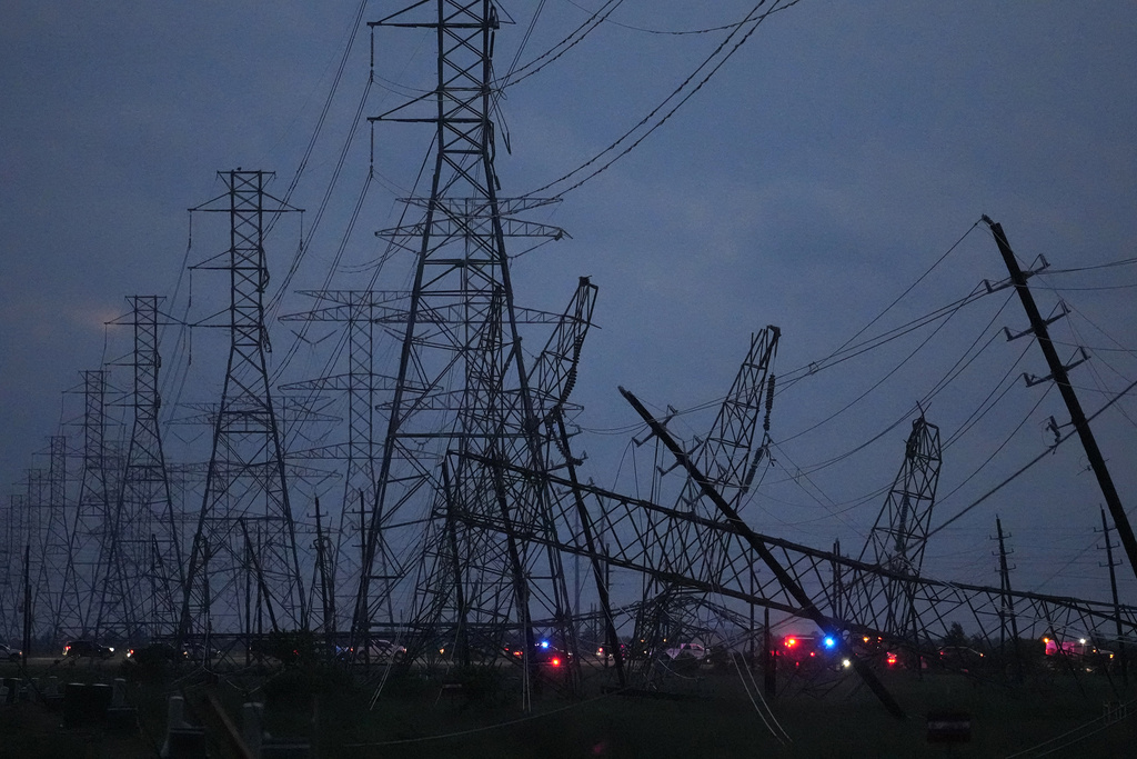 Transmission power lines are down near the Grand Parkway and West Road after a storm in Cypress, Texas