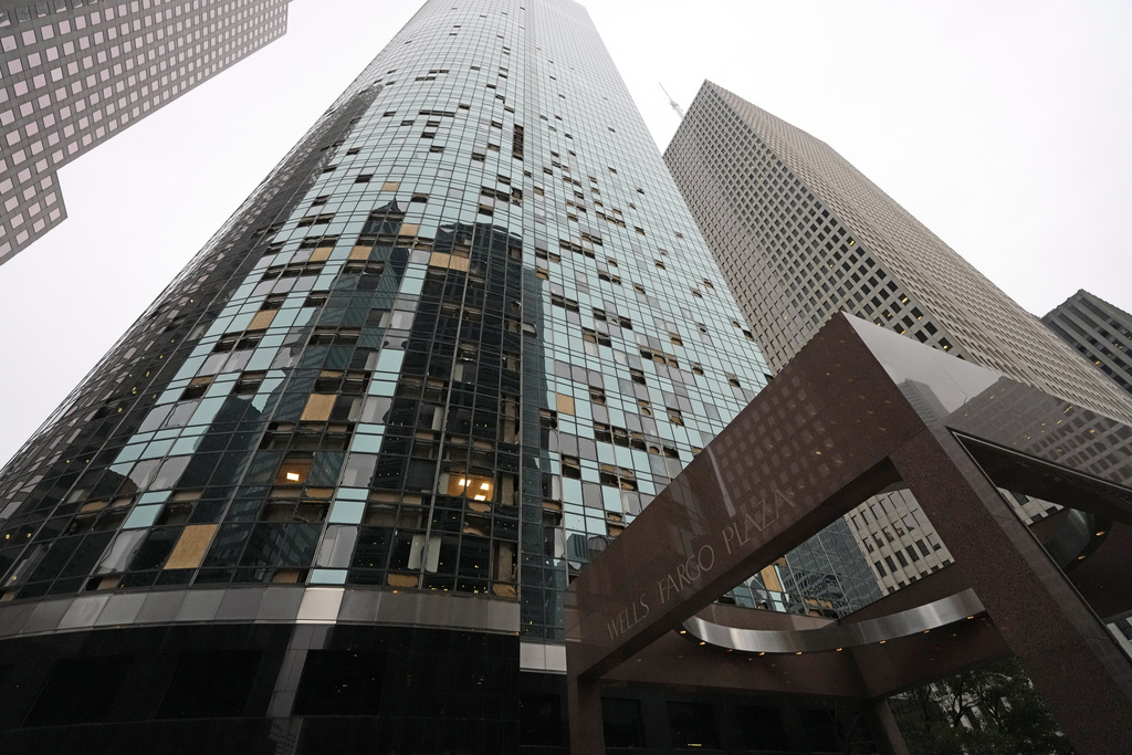 Blown out windows on a high-rise downtown Houston building are shown in the aftermath of a severe thunderstorm 