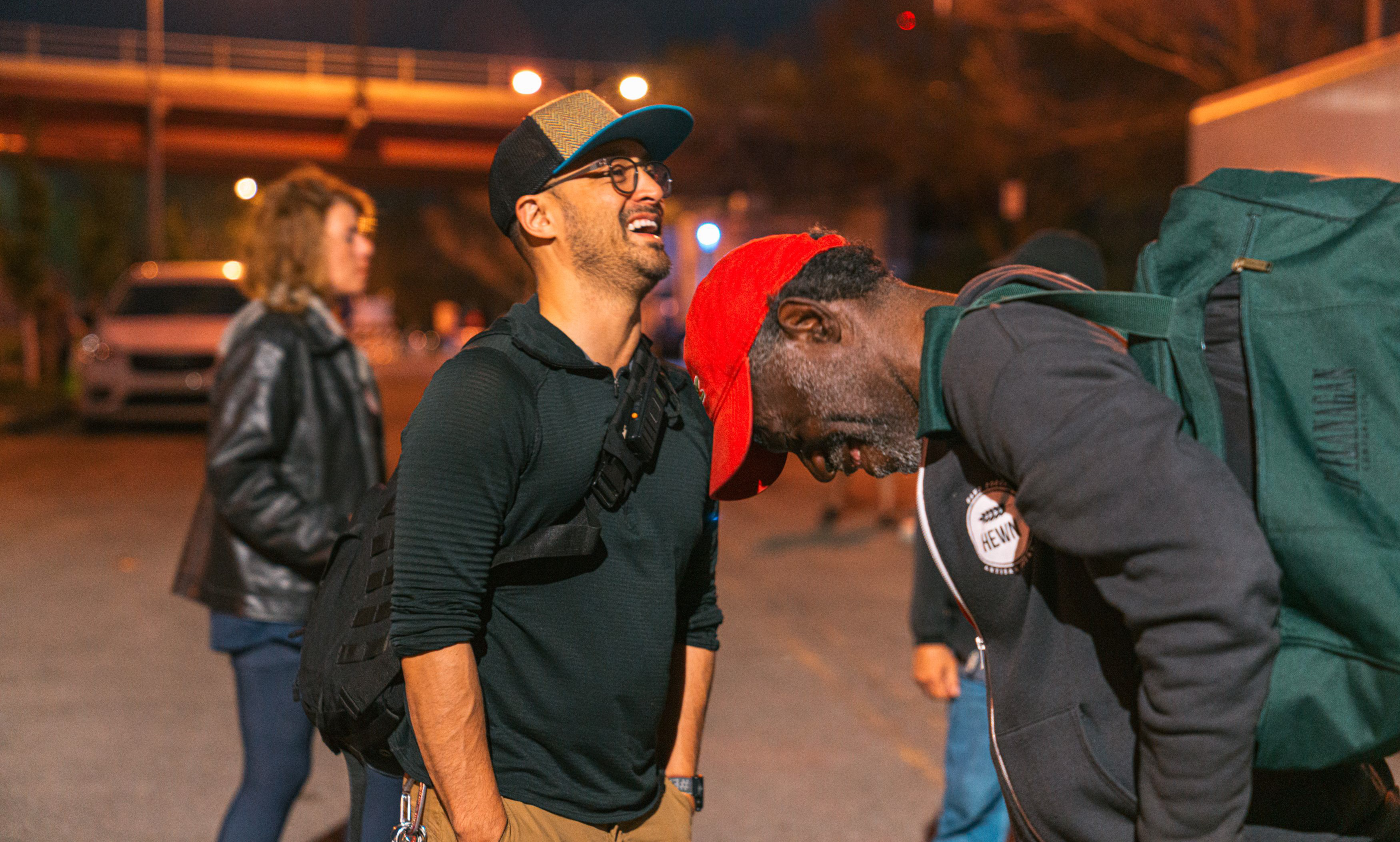 Two men laughing