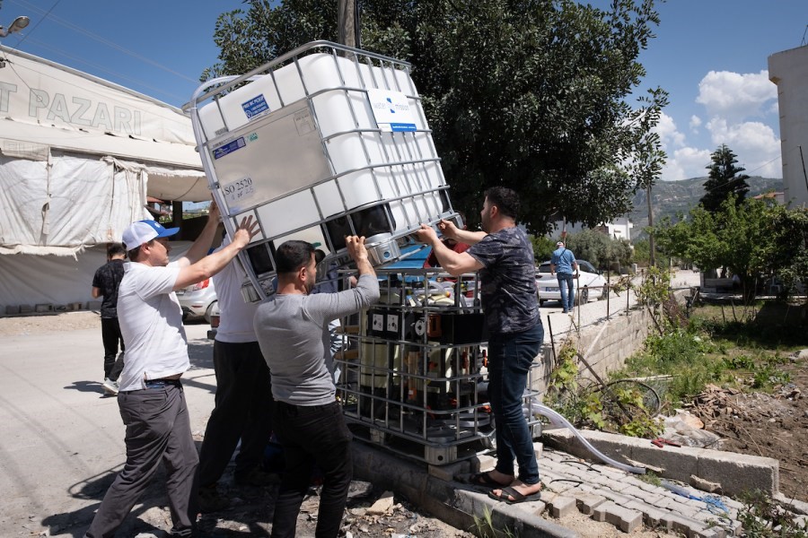 Water Mission DART members assemble a safe water system