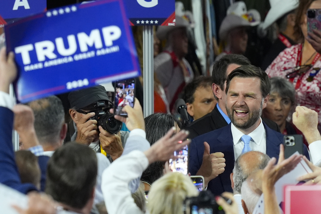 Republican vice presidential candidate Sen. JD Vance, R-Ohio, gives a thumbs-up to supporters as he is introduced during the first day of the Republican National Convention