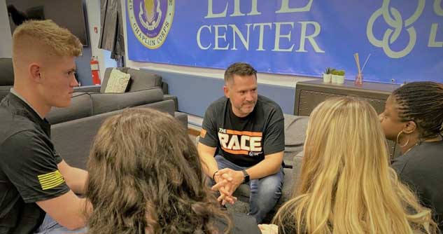 YFCM Dale Mace with group of kids