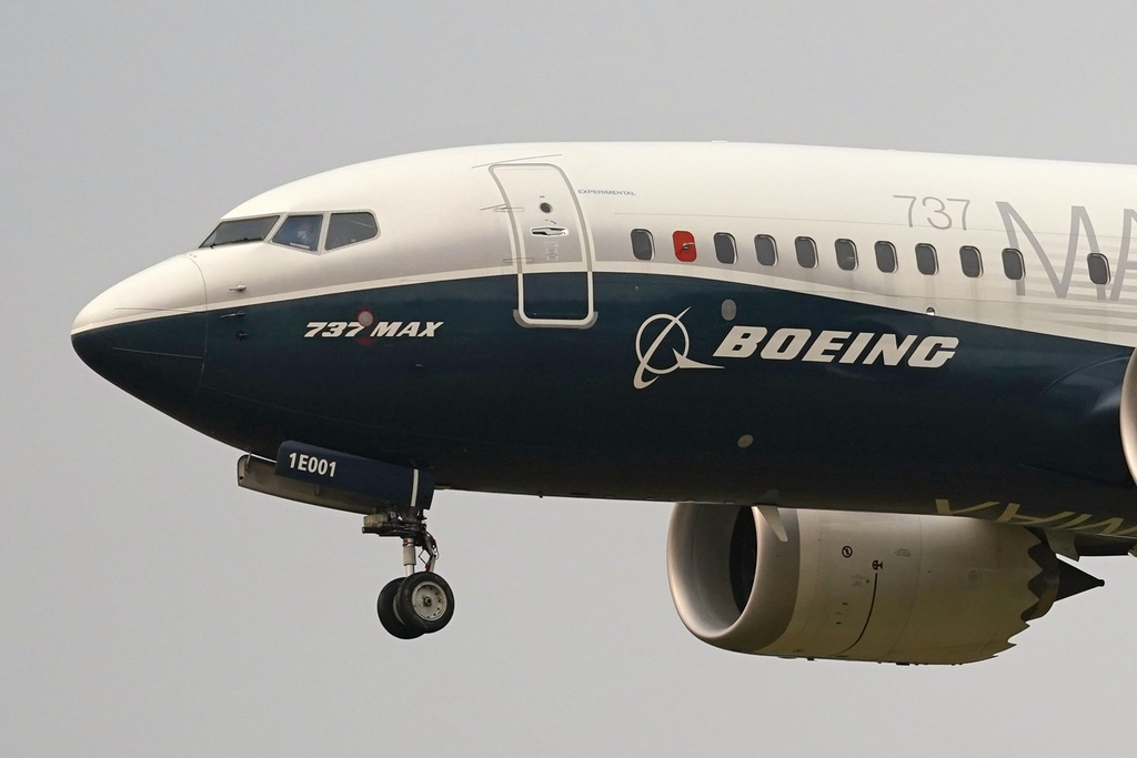A Boeing 737 Max jet, piloted by Federal Aviation Administration (FAA) chief Steve Dickson, prepares to land at Boeing Field following a test flight on Sept. 30, 2020