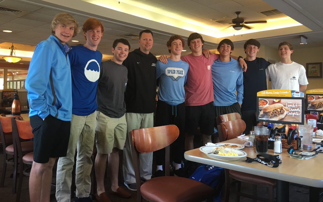 Josh with 8 young men at the pancake place