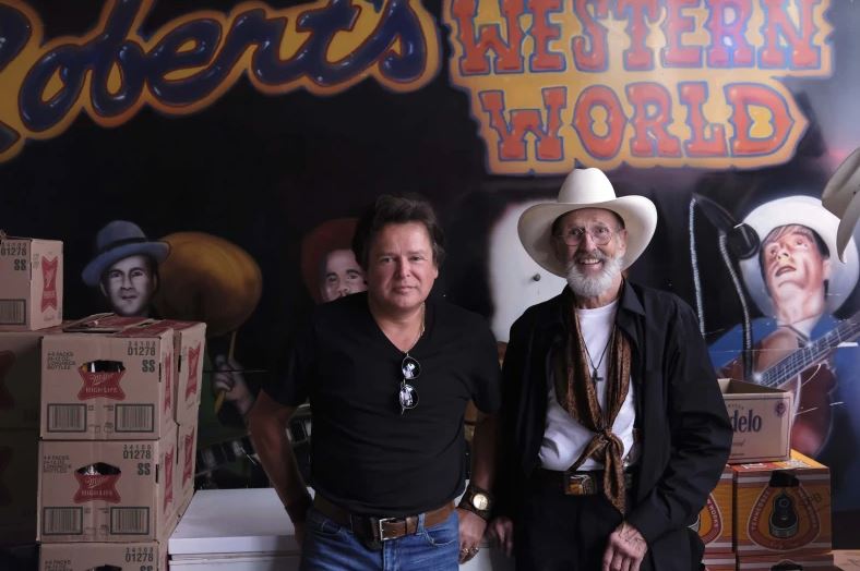 JesseLee Jones and the Rev. Ron Blakely pose at Robert’s Western World on Sunday, July 28, 2024