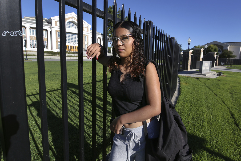 Melinda Gonzalez, 14, poses at Fresno High School where she