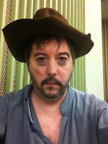 Dr. Cloy in costume in a local opera as "the town drunk"
