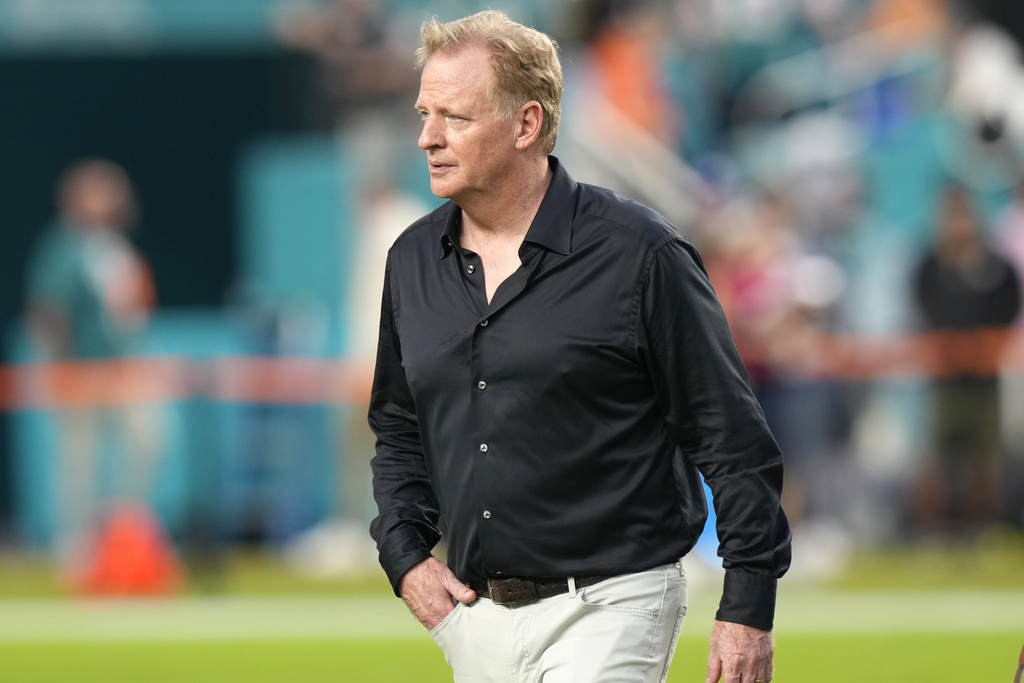 NFL Commissioner Roger Goodell walks on the field before an NFL football game between the Miami Dolphins and the Buffalo Bills