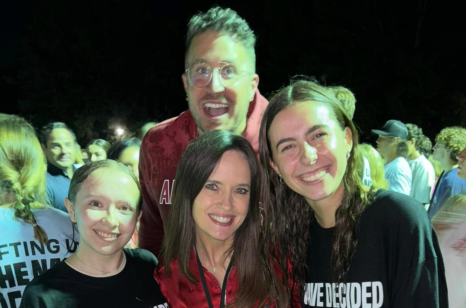 Four smiling people at the baptism