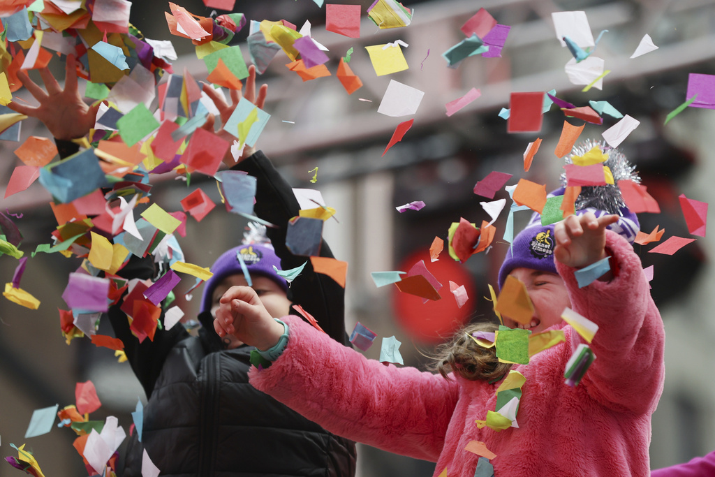 On Sunday, fistfuls of confetti were flung toward crowds in the square