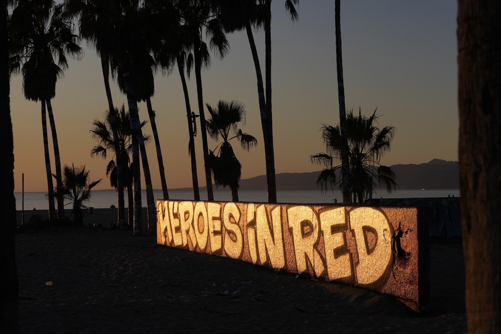 A mural by Sergei Statsenko, who also goes by the artist name Steeke, thanks firefighters in the Venice Beach area of Los Angeles