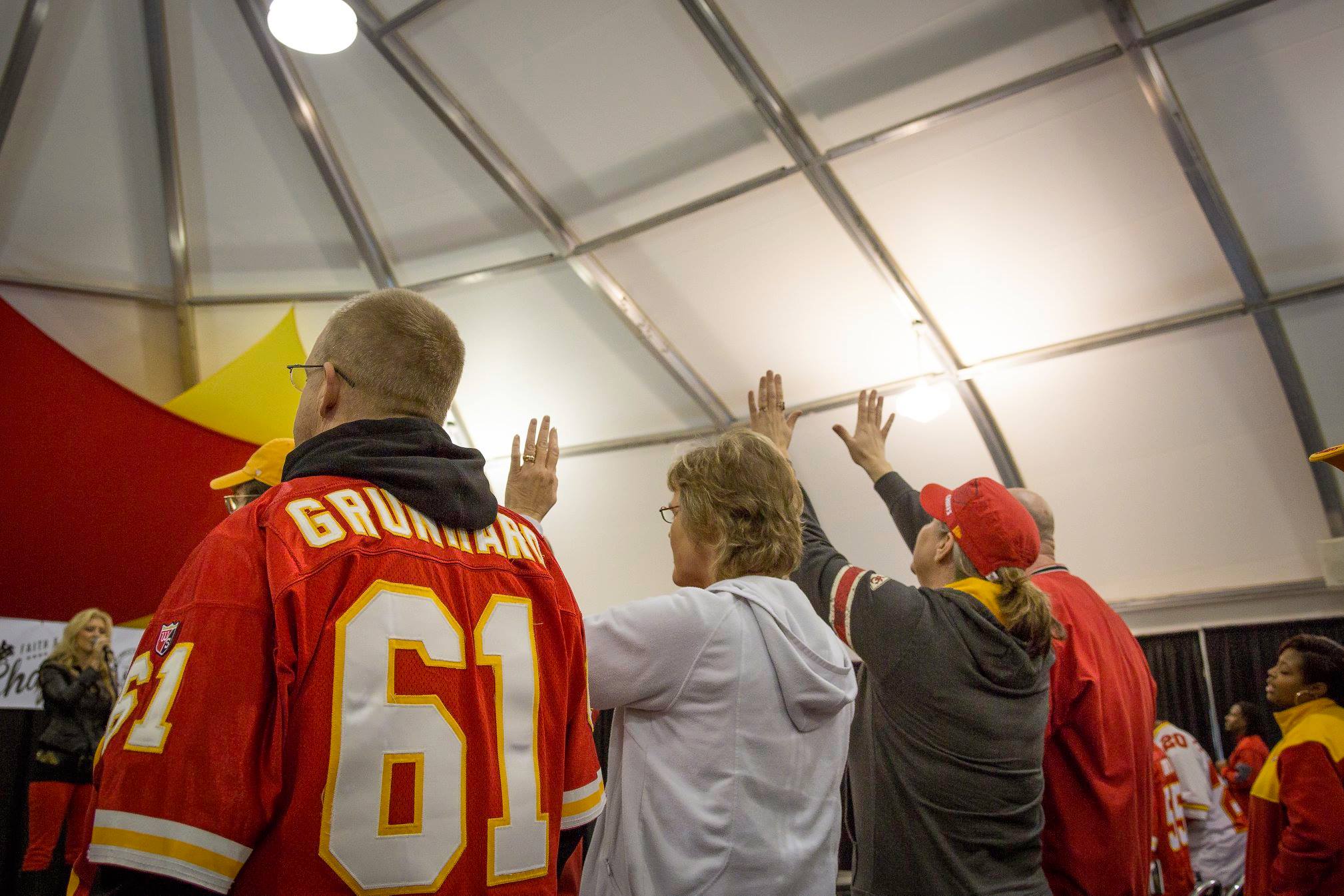 Chiefs fans attending the Faith & Family Chapel before gameday at Arrowhead Stadium.