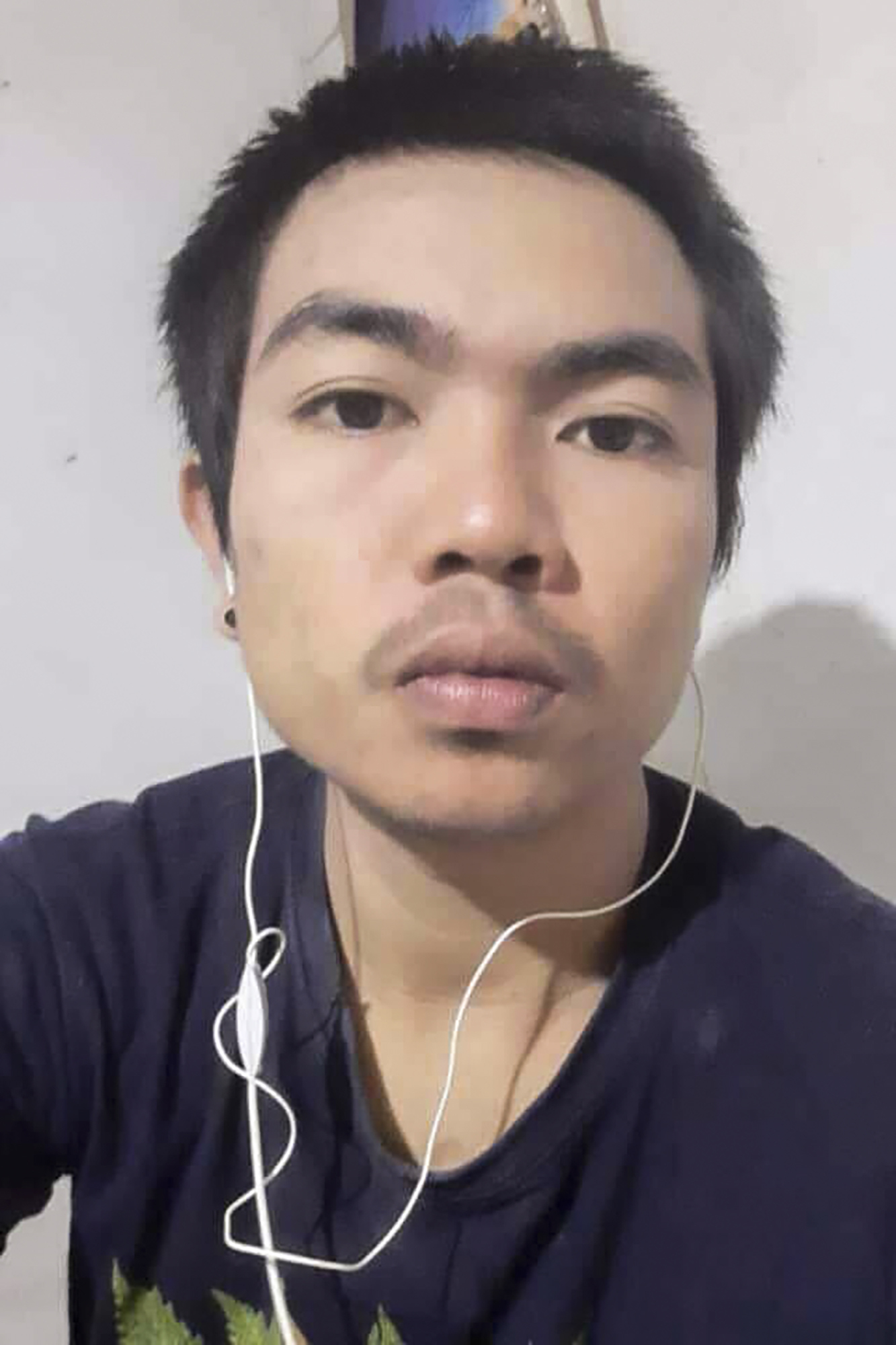 Young man with earphones in his ears