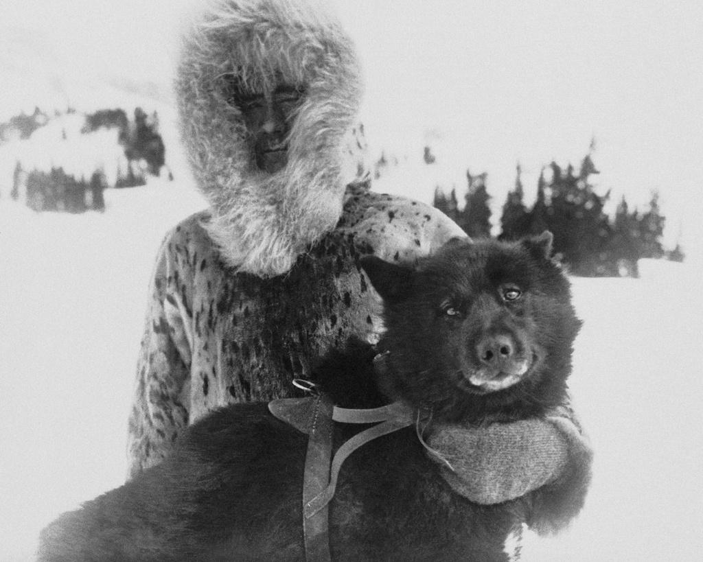 Gunnar Kaasen and with his dog Balto, the heroic dogsled team leader, sit for a portrait in the early 1920s.