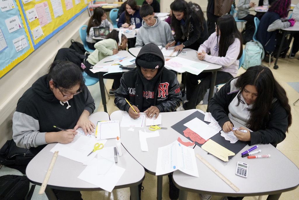 Students work in a classroom at Benjamin O. Davis Middle School in Compton, Calif.