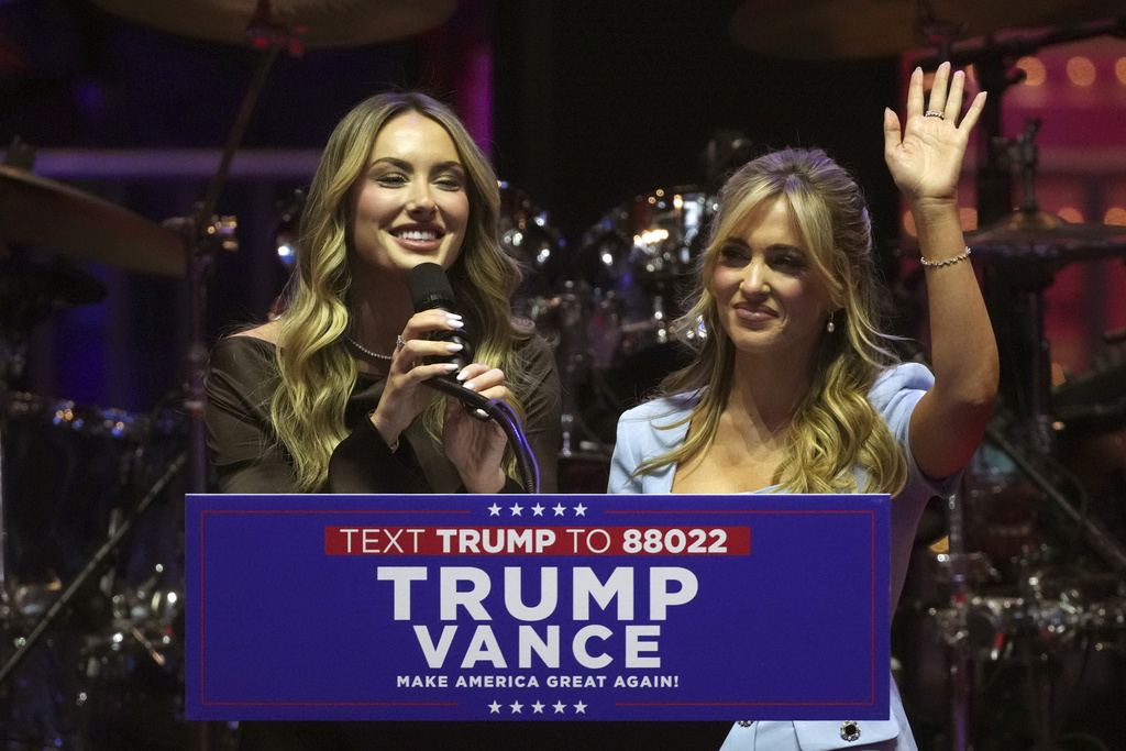 Podcast hosts of "Girls Gone Bible", Angela Halili and Arielle Reitsma, speak before President-elect Donald Trump arrives at a rally ahead of the 60th Presidential Inauguration, Sunday, Jan. 19, 2025, in Washington. 