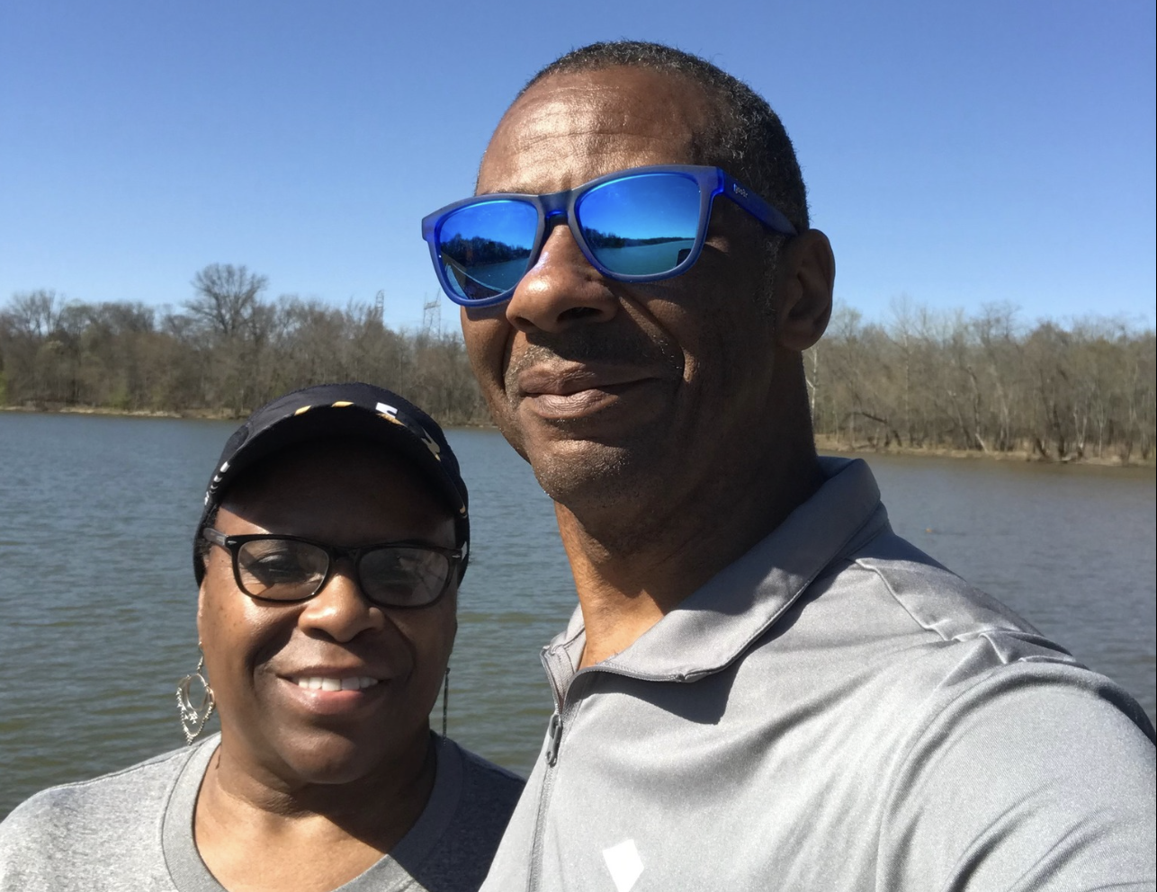 Man and woman, smiling outdoors