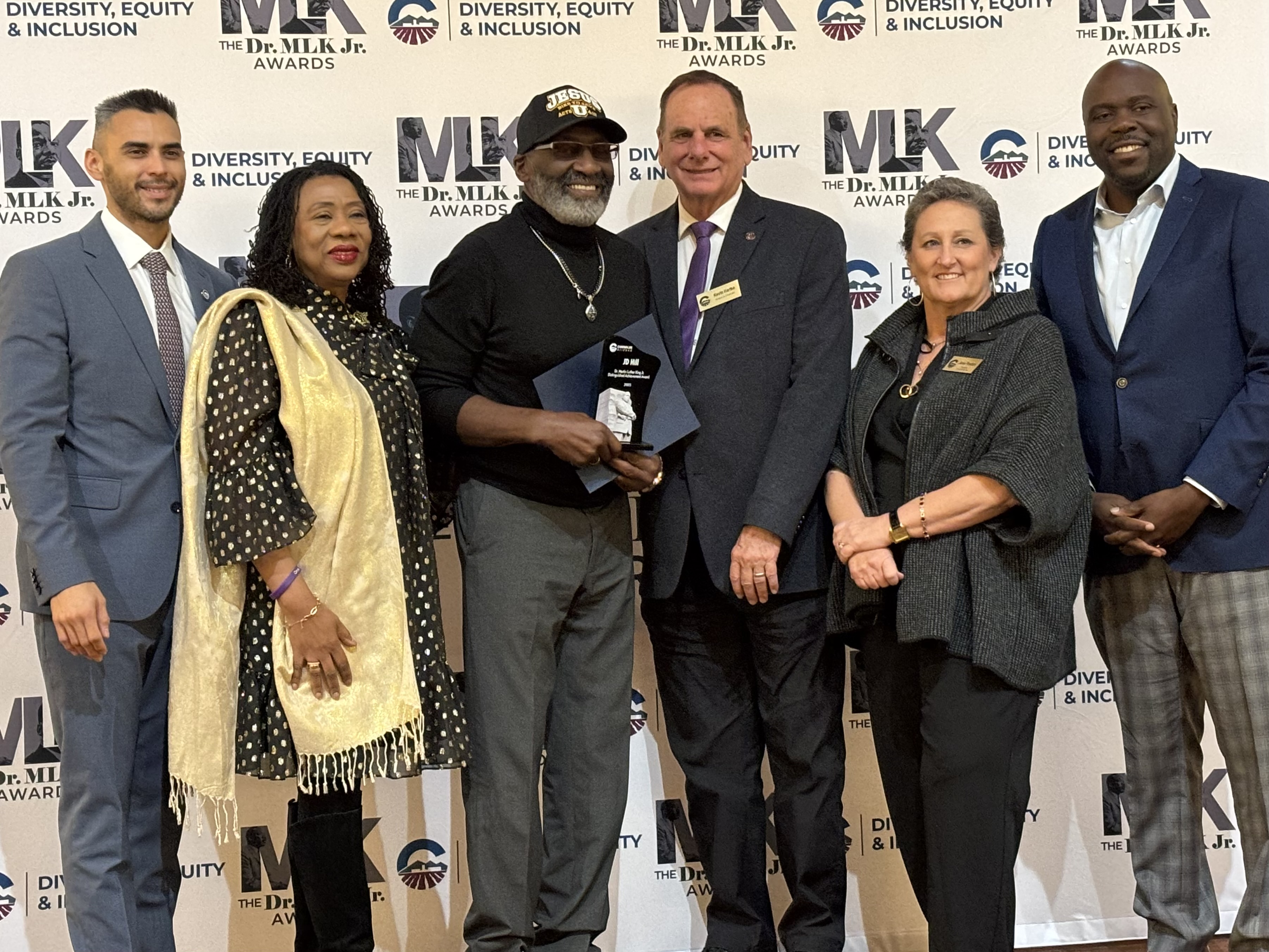 J.D. Hill receiving an MLK Award