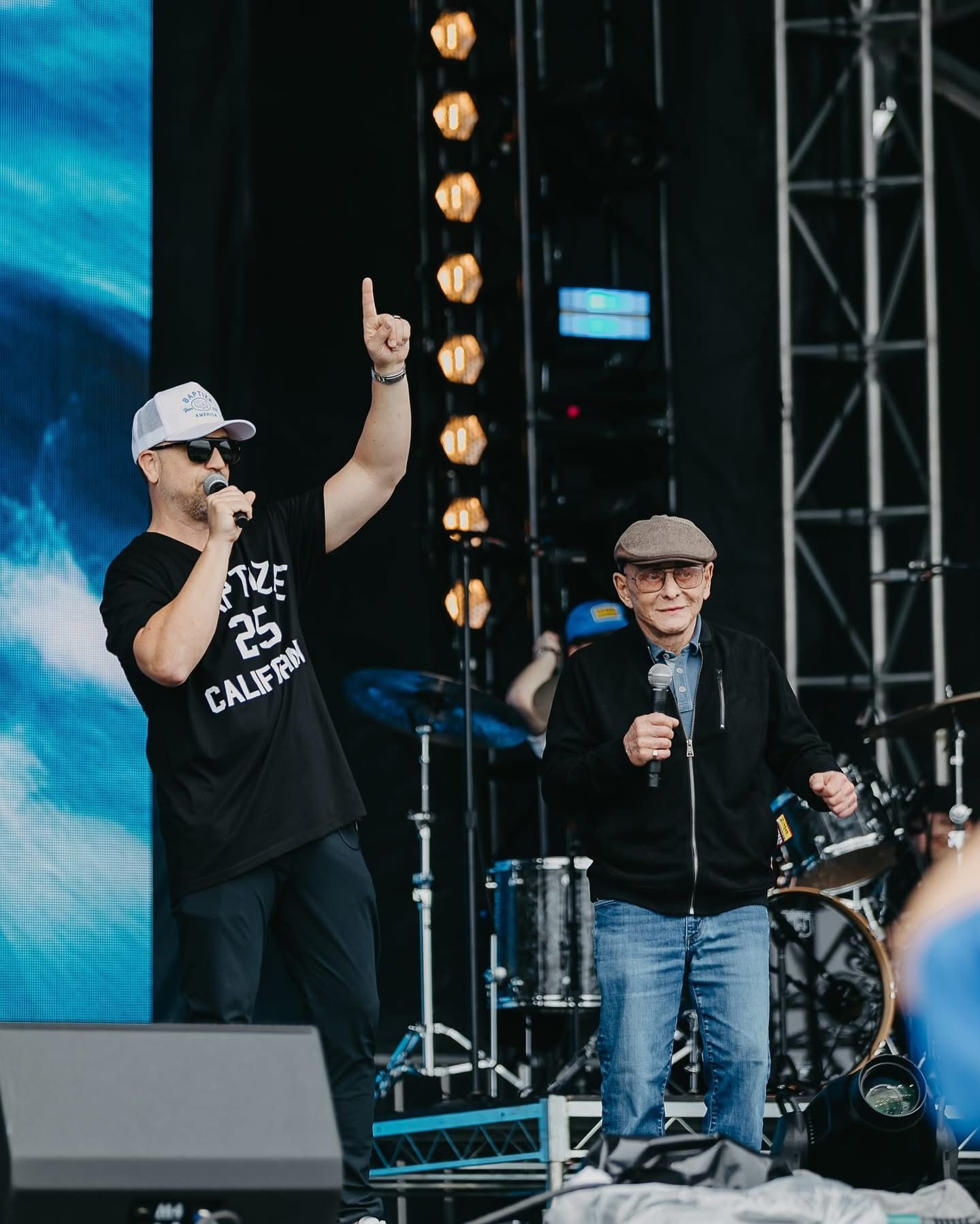 Pastor Mark Francey of Oceans Church shares the stage with Sammy “The Bull” Gravano at Baptize California
