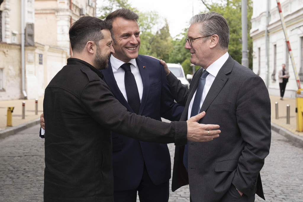 Ukrainian President Volodymyr Zelensky, left, Britain