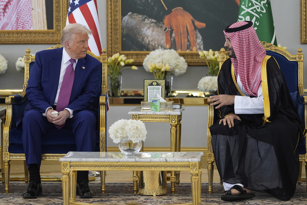 President Donald Trump speaks with Saudi Crown Prince Mohammed bin Salman during a coffee ceremony at the Royal Terminal of King Khalid International Airport in Riyadh