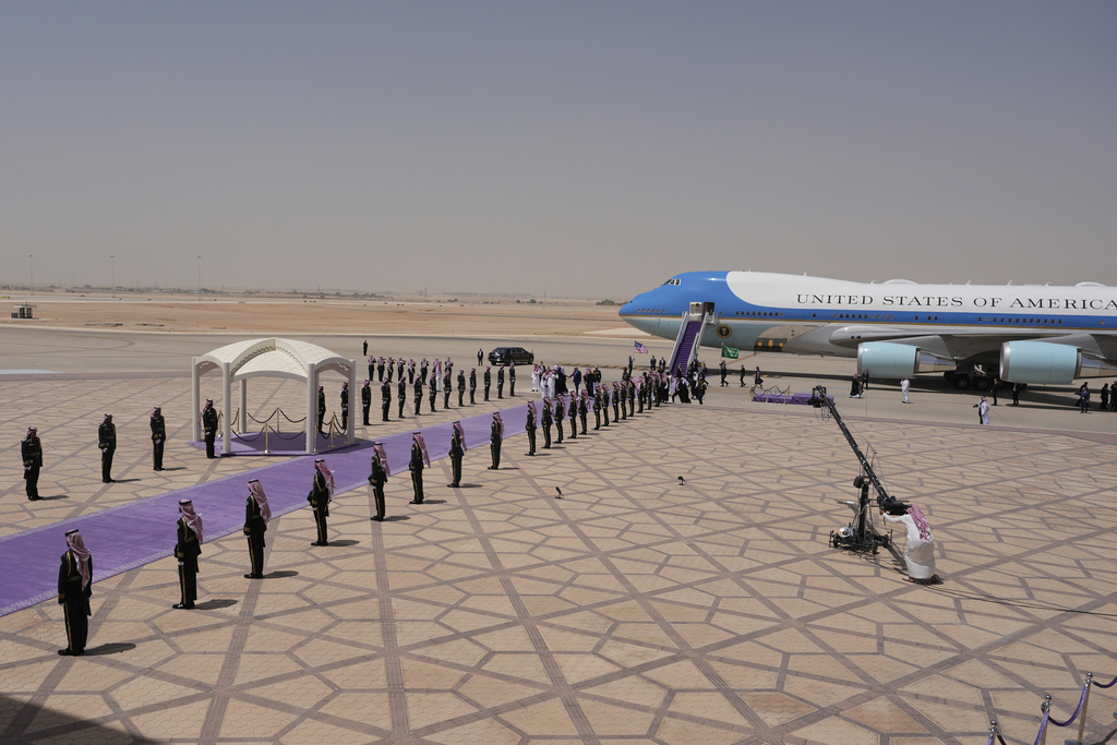 President Donald Trump walks with Saudi Crown Prince Mohammed bin Salman during an arrival ceremony at the Royal Terminal of King Khalid International Airport in Riyadh
